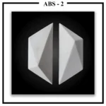 Two separate Luxture Abstract ABS-2 wall tiles with crystal-like facets against a black background.