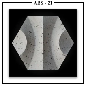 A single Luxture Abstract ABS-21 hexagonal panel featuring two large opposing concave curves and a rough, pitted texture.