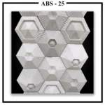 An assembled wall of Luxture Abstract ABS-25 hexagonal tiles showing a radial line pattern and a central pyramid design on each.