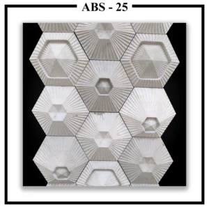 An assembled wall of Luxture Abstract ABS-25 hexagonal tiles showing a radial line pattern and a central pyramid design on each.