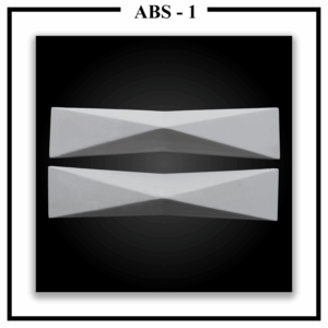 Two Luxture Abstract ABS-1 geometric wall panels with faceted surfaces, creating an hourglass shape against a black background.