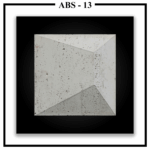 A single square Luxture Abstract ABS-13 wall panel with an asymmetrical pyramid design and a rough, pitted texture.
