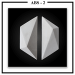 Two separate Luxture Abstract ABS-2 wall tiles with crystal-like facets against a black background.