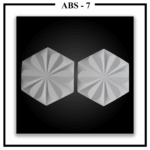 Two Luxture Abstract ABS-7 hexagonal wall panels, each with a radial design of raised, teardrop-shaped petals.